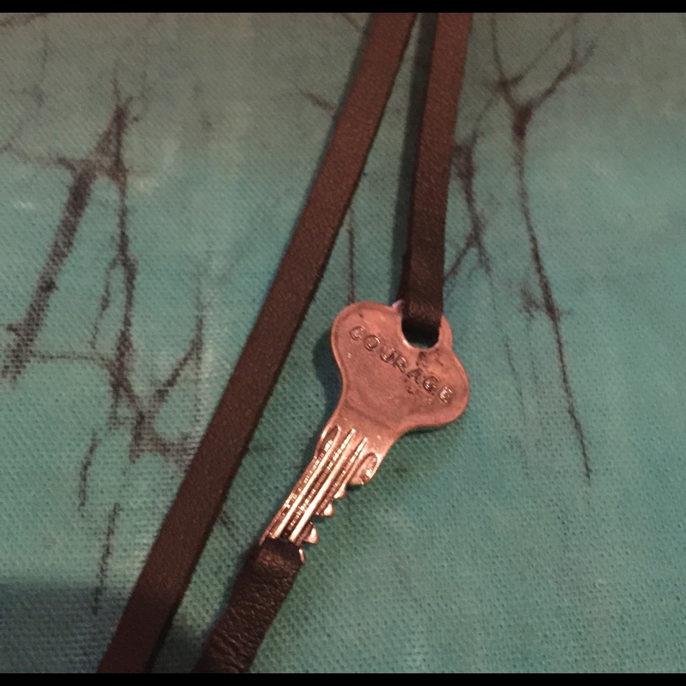 Leather band bracelet representing COURAGE